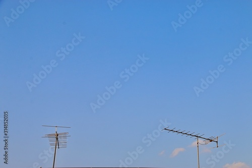 Antenna with blue sky. Close up antenna