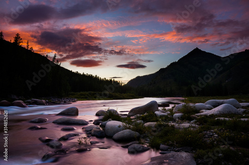 Siberian mountain Balyiktyig hem river at sunset. Long exposure. photo