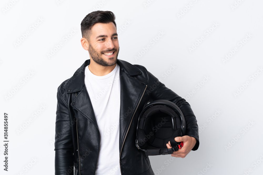 Man with a motorcycle helmet laughing