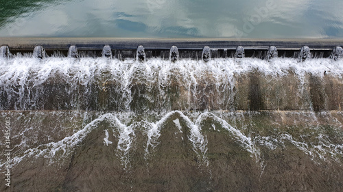 Water flowing stream dam at the Yudeung-cheon in Daejeon, South Korea. photo