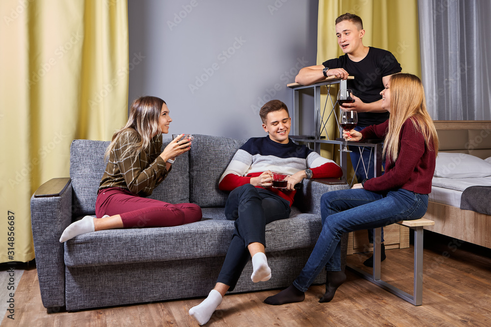 Double date, friends communicate and drink wine. Double date, friends communicate and drink wine.