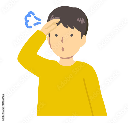 黄色い服を着たホッとする男の子