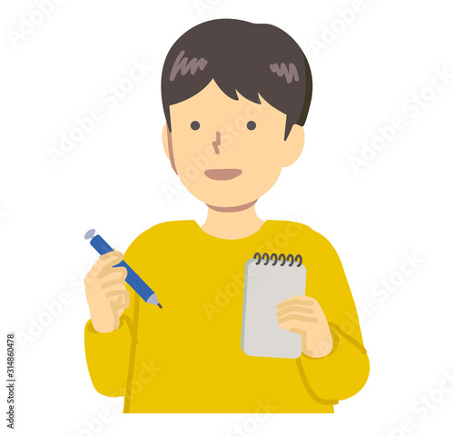  黄色い服を着たメモをとる男の子 