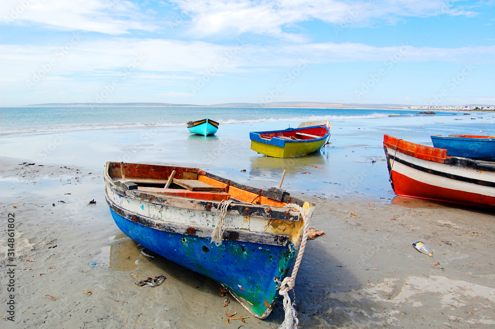 Colorful wooden fishing boats on the beach