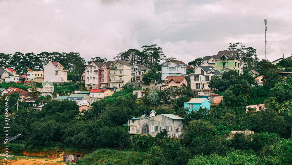 Fototapeta premium Brick houses on hill in Dalat, Vietnam