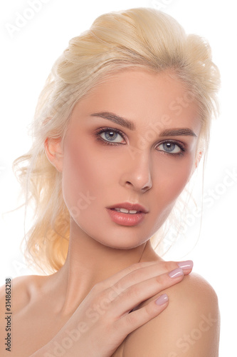 Beautiful natural girl with smooth skin and natural make-up isolated on white background. Skin care concept.