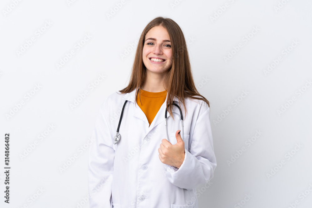 Young woman over isolated background wearing a doctor gown and with thumb up Young woman over isolated background wearing a doctor gown and with thumb up