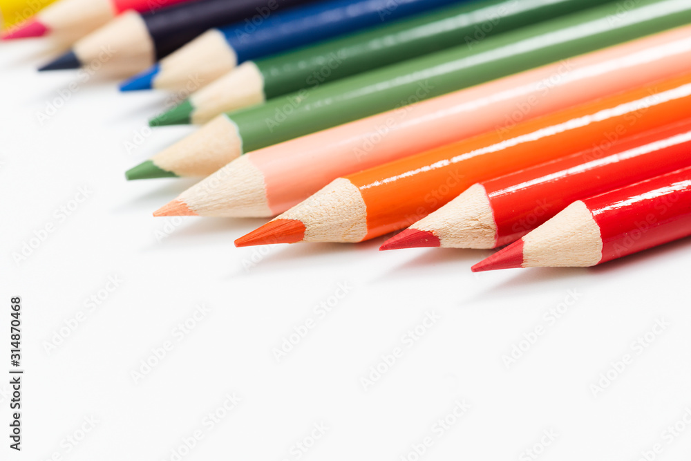 Multi color pencils. the concept of a multinational family and equality in the world. Multi color pencils. the concept of a multinational family and equality in the world.