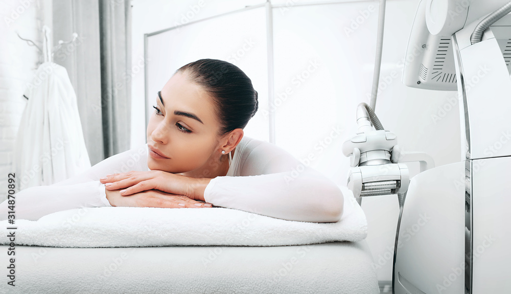beautiful woman awaiting a lpg massage. With the help of lpg massage she get rid of cellulite beautiful woman awaiting a lpg massage. With the help of lpg massage she get rid of cellulite