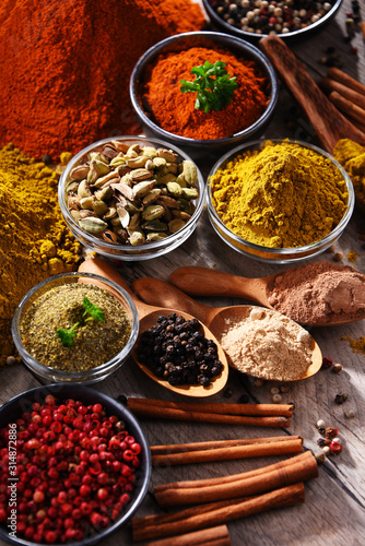 Fototapeta Naklejka Na Ścianę i Meble -  Variety of spices on kitchen table