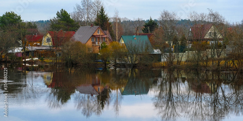 country houses on a bank of Volhov river in Volhov, Russia