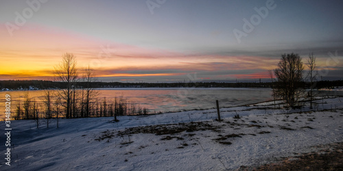 Landscape with the image of the ice covered frozen river Kem in Karelia  Russia
