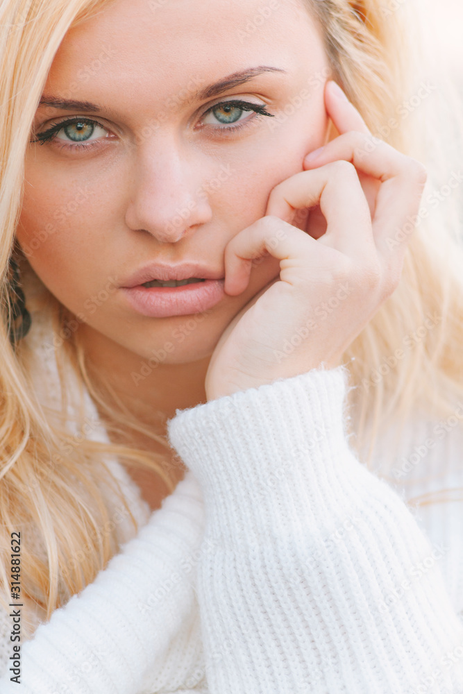 Girl in sweater close-up portrait outdoor. Warm fall. Girl in sweater close-up portrait outdoor. Warm fall.