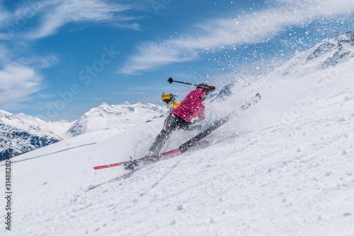 Girl skier accident crash on a ski slope on a sunny day, Solden, Austria, Europe