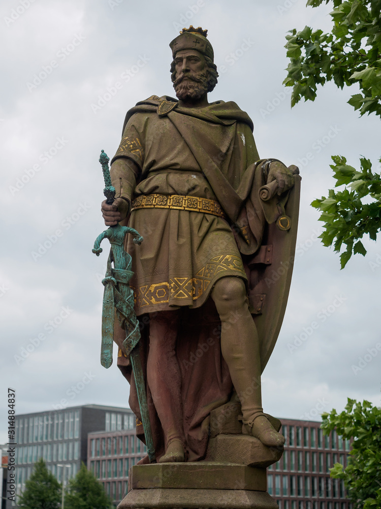 The historic Adolf III statue on Trostbrucke bridge in Hamburg, Germany