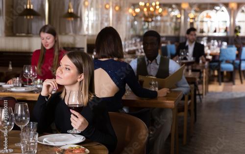 Elegant female is celebrating of birthday for dinner