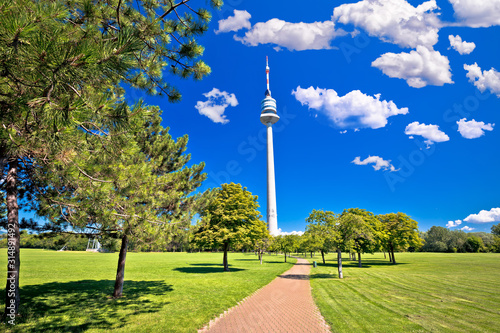 Donaupark landscape walkway and Donauturm tower view in Vienna photo