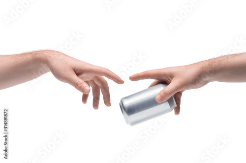 Two male hands passing one another blank metallic soda can on white background (ID: 314891872)