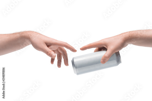 Two male hands passing one another blank white beer can on white background