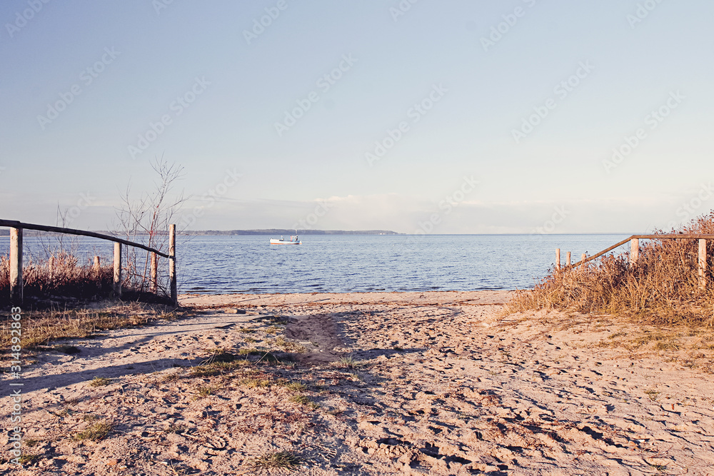 beach view by the baltic sea with sand and water
