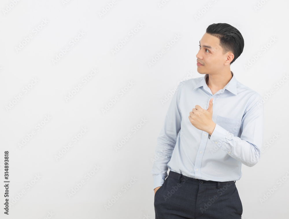 Young handsome asian business man smiling and showing thumbs up isolated on white background. Young handsome asian business man smiling and showing thumbs up isolated on white background.