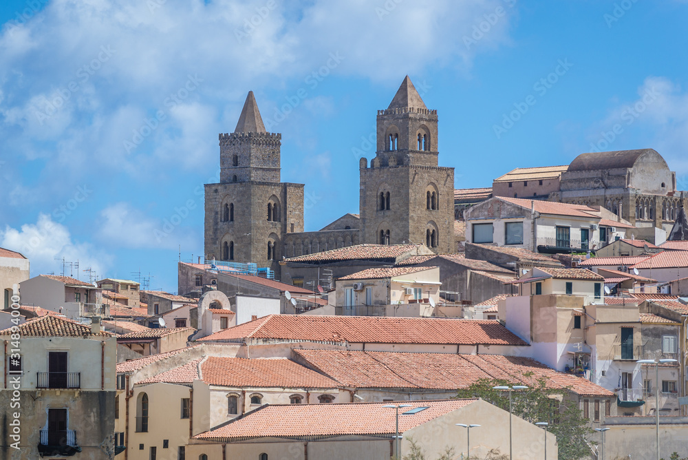 Tower of cathedral on the Old Town of Cefalu city located on the Tyrrhenian Sea on Sicily Island in Italy