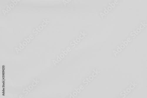 White fabric texture background with soft waves.