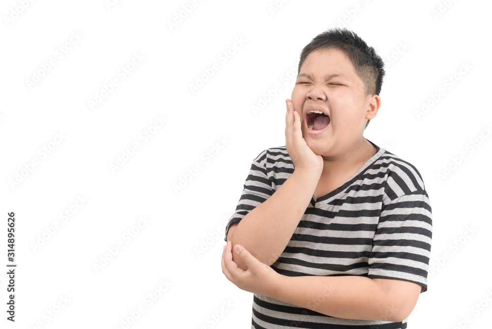 Unhappy obese boy suffering from toothache isolated Unhappy obese boy suffering from toothache isolated