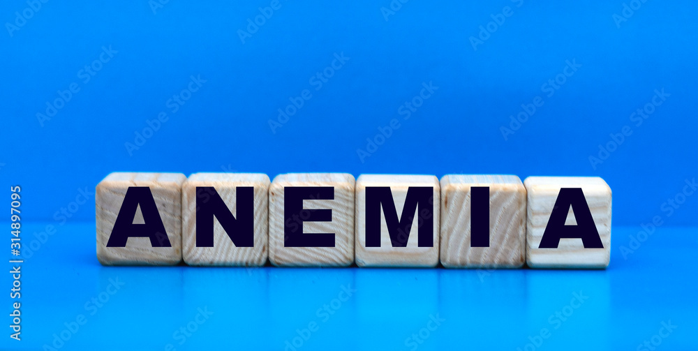 concept word anemia on cubes on a blue background