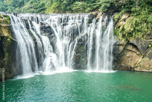Fototapeta Naklejka Na Ścianę i Meble -  Shihfen Waterfall, Fifteen meters tall and 30 meters wide, It is the largest curtain-type waterfall in Taiwan