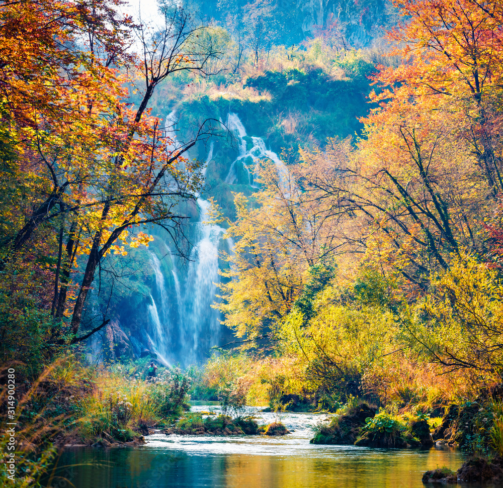 Fototapeta Amazing morning view of pure water waterfall in Plitvice National Park. Great autumn scene of Croatia, Europe. Abandoned places of Plitvice lakes series. Beauty of nature concept background.