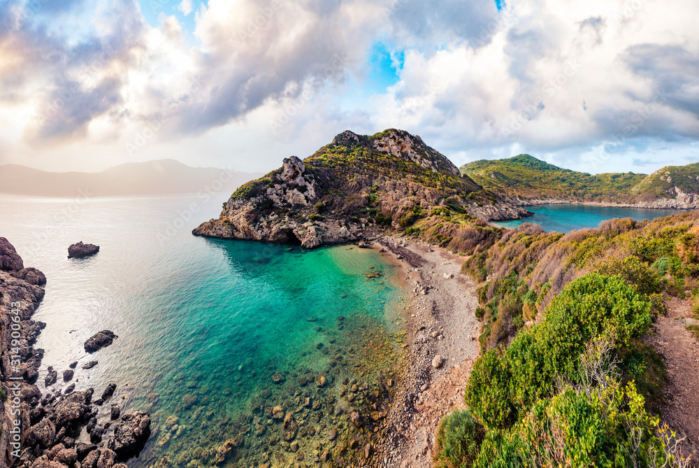 Beautiful spring scene of Pirates Bay, Porto Timoni, Afionas village location. Perfect morning seascape of Ionian Sea. Fantastic outdoor scene of Corfu island, Greece, Europe. Beautiful spring scene of Pirates Bay, Porto Timoni, Afionas village location. Perfect morning seascape of Ionian Sea. Fantastic outdoor scene of Corfu island, Greece, Europe.