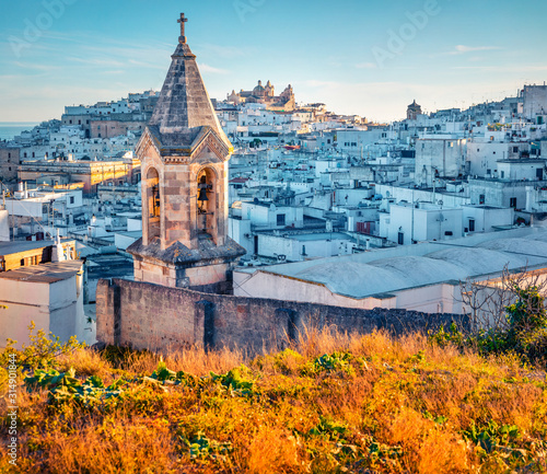 Exciting morning cityscape of Ostuni town. Impressive outdoor scene of Apulia region, Italy, Europe. Traveling concept background.