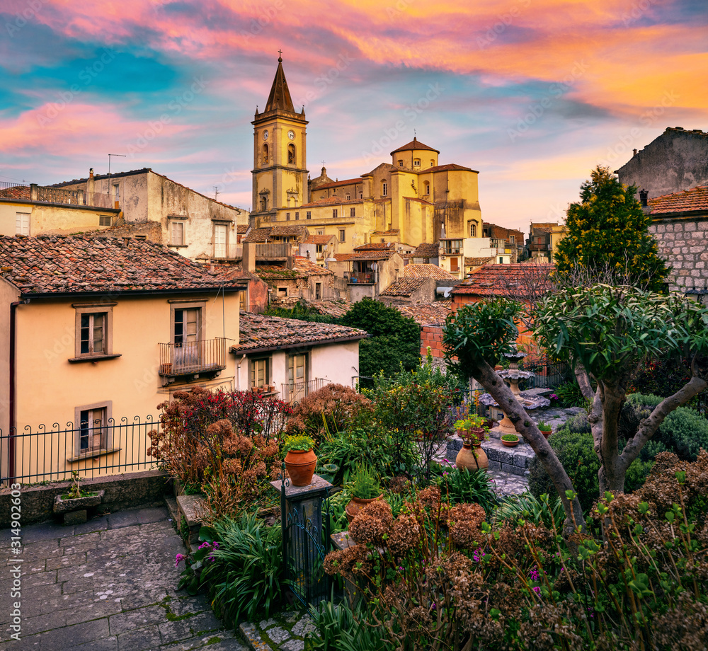 Fantastic cityscape of Novara di Sicilia town. Colorful spring sunrise in Sicily, Italy, Europe. Beautiful world of Mediterranean countries. Traveling concept background.