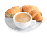 Fresh croissants and coffee on white background