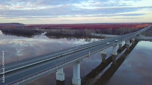 Wallpaper Mural Traffic on a bridge over wide river in the autumn. View from above Torontodigital.ca