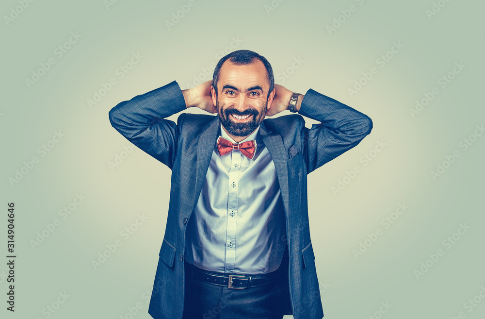 man keeping hands behind his head looking surprised man keeping hands behind his head looking surprised