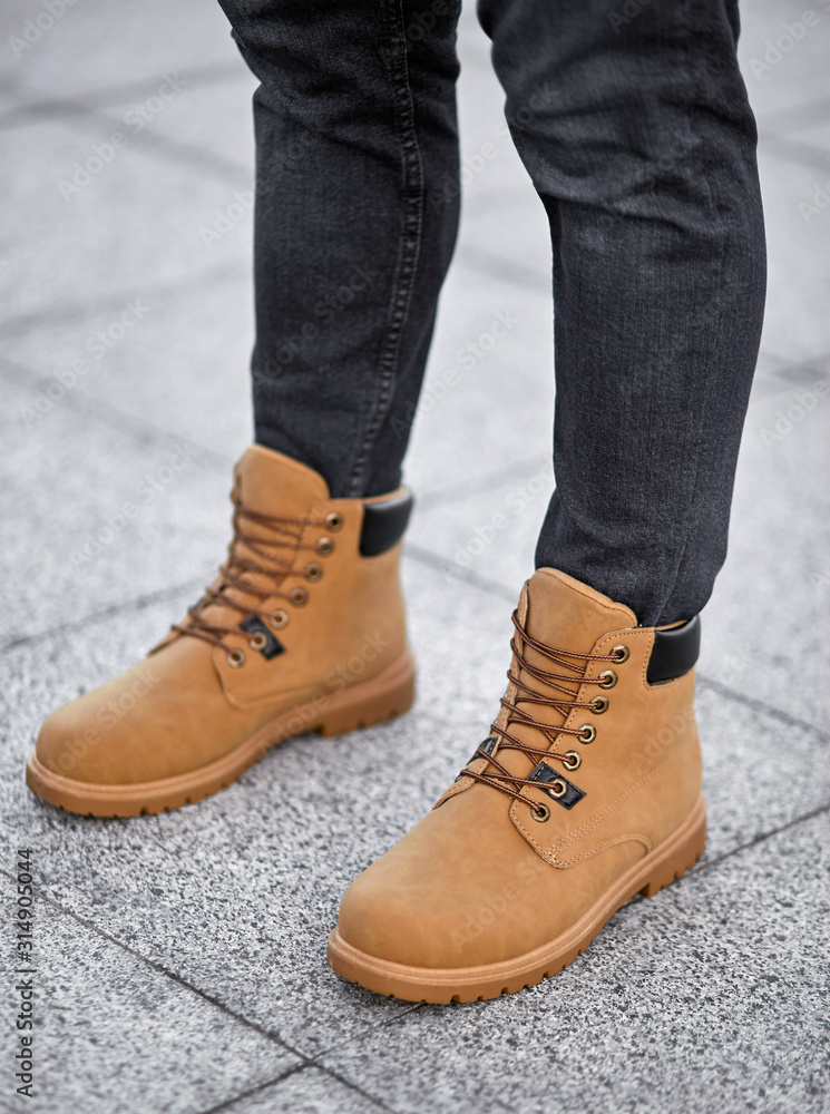 standing man legs in suede plain boots standing man legs in suede plain boots