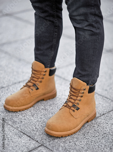 standing man legs in suede plain boots