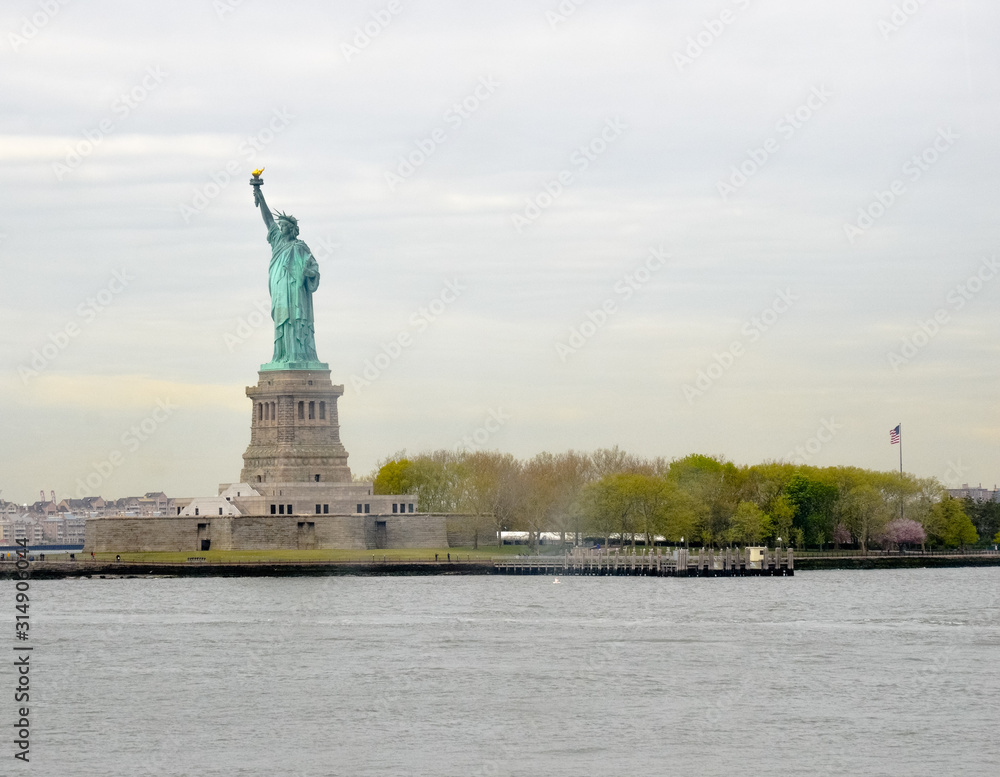 Statue of Liberty on a small island next to Manhattan New York in the USA