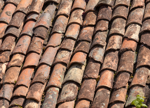 Close up of old ceramic roof tiles © wjarek