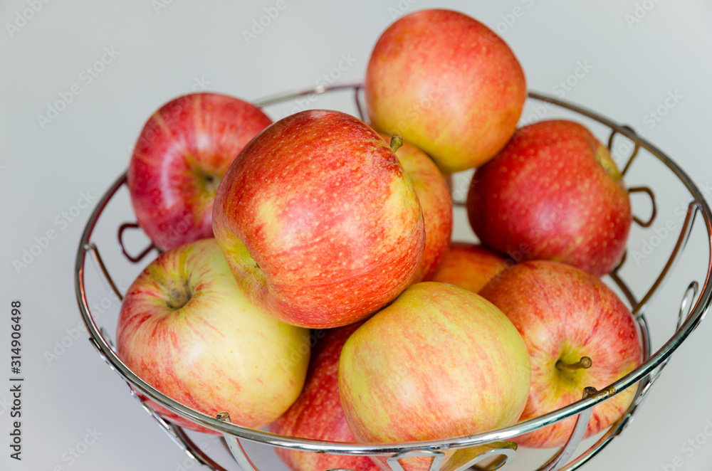 Bowl of apples red-yellow variety Gala sweet fruit full of vitamins fiber minerals and sweet juice. Bowl of apples red-yellow variety Gala sweet fruit full of vitamins fiber minerals and sweet juice.