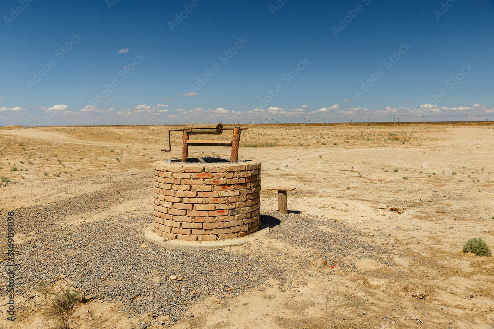 Φωτογραφία water well in the steppes of Kazakhstan, Turkestan, archeological town Savran