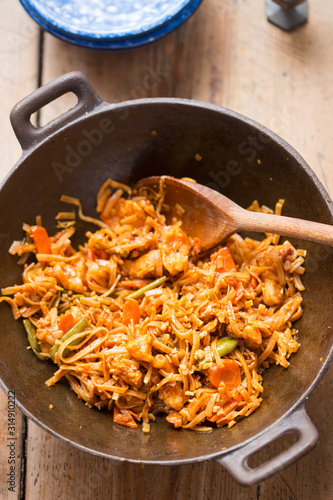 Pad thai chicken  with vegetables and nuts
