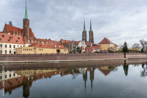 Collegiate Church and St John the Baptist Cathderal located in Ostrow Tumski district - historic part of Wroclaw city in Poland photo