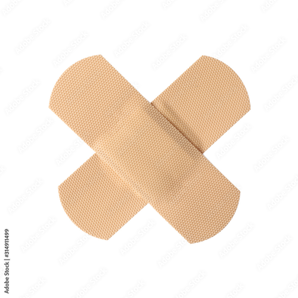 Medical sticking plasters isolated on white. First aid item Medical sticking plasters isolated on white. First aid item