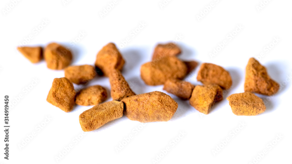 Scattered instant coffee on a white background, energetic drink