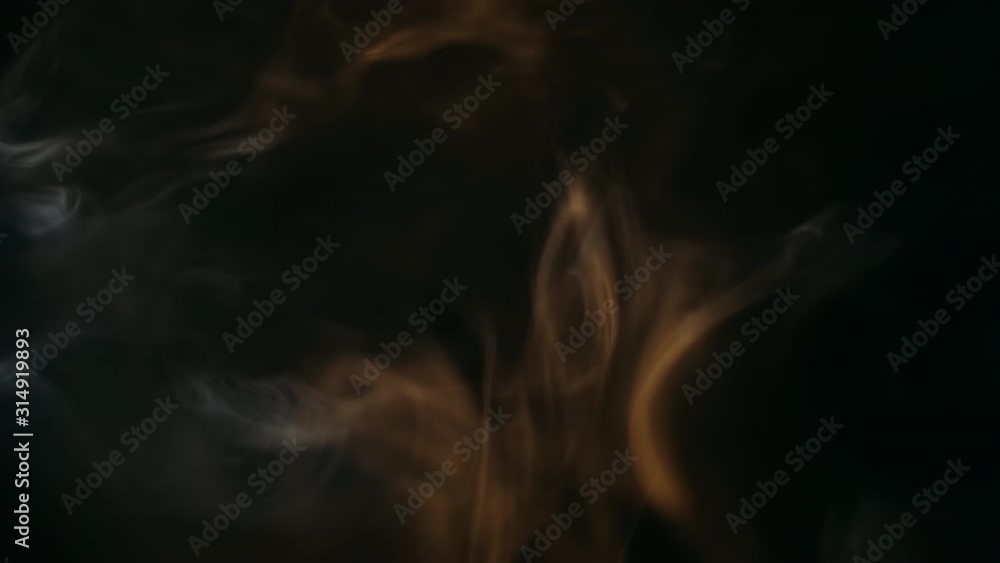 Abstract Forms Of Smoke On Black Background.