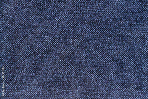 Texture of blue knitted woolen or knitted fabric.