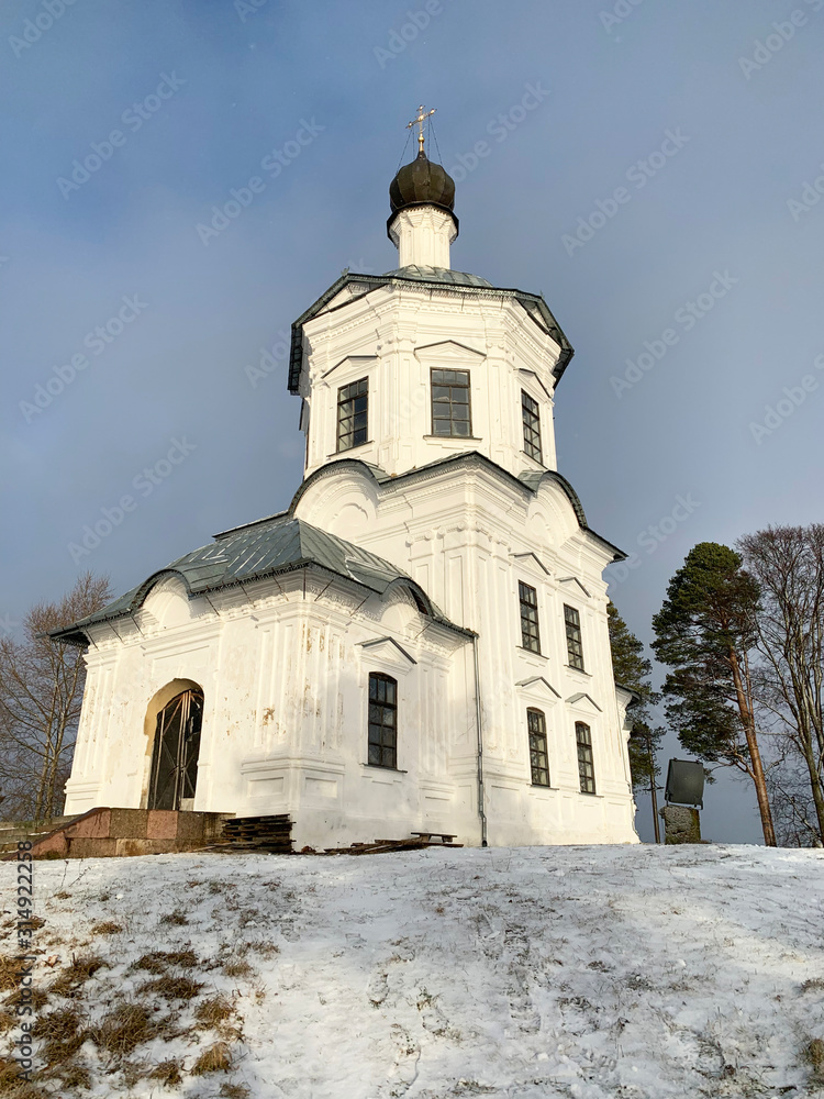 Monastery of Nilo-Stolobenskaya (Nilov) deserts in the Tver region. Church of the exaltation of the cross in winter Monastery of Nilo-Stolobenskaya (Nilov) deserts in the Tver region. Church of the exaltation of the cross in winter